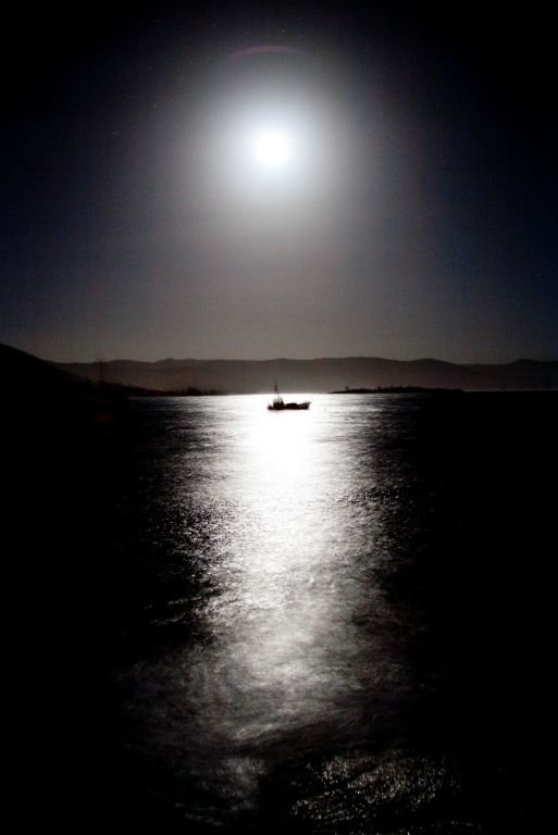 Fishing boat in the moonlight Bicheno Tasmania, Australia 